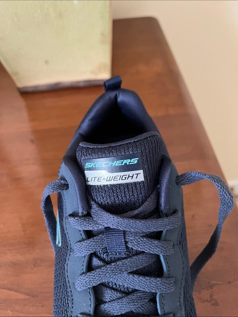 Skechers Women's Navy Sneakers with Mint Green Accents